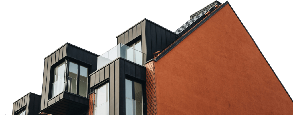 Fachada de edificio residencial de lujo con arquitectura contemporánea y ventanales amplios